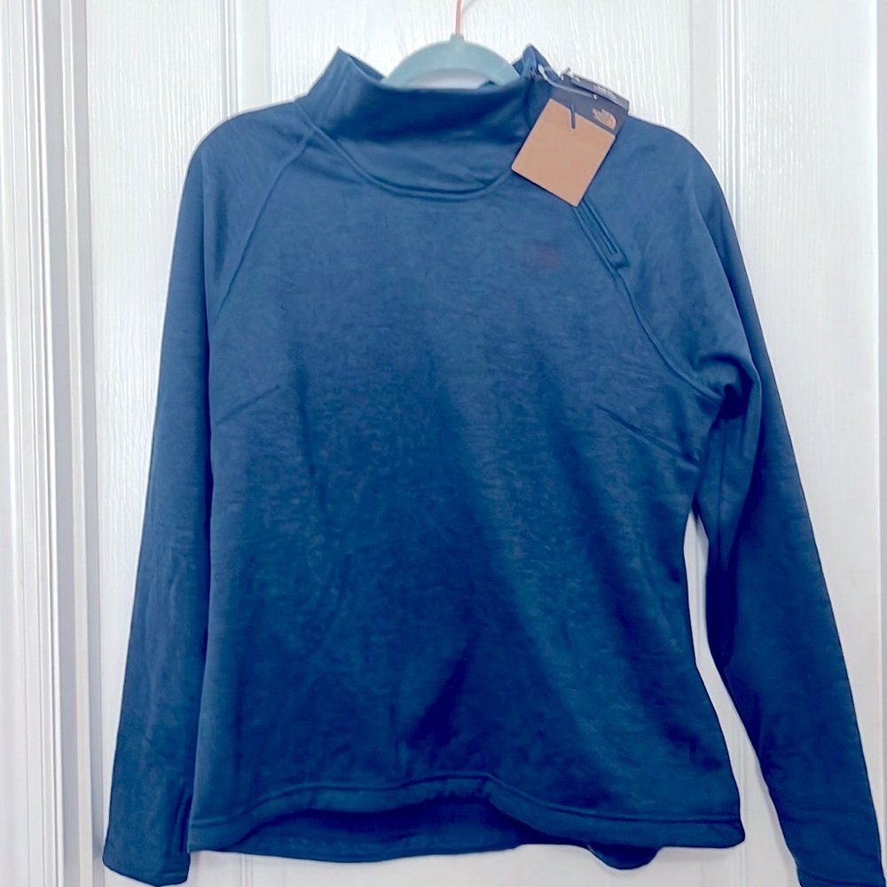 NWT North Face teal pullover with neck side zipper and thumb holes, size large.